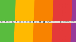 A screenshot of a Mac's cluttered menu bar against a rainbow-colored background.